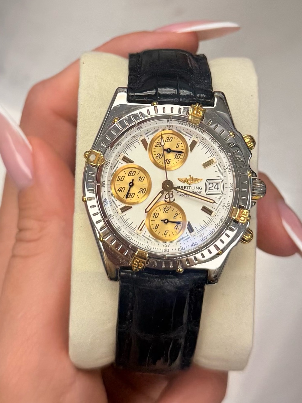 Breitling Gold Chronograph Watch with White Dial